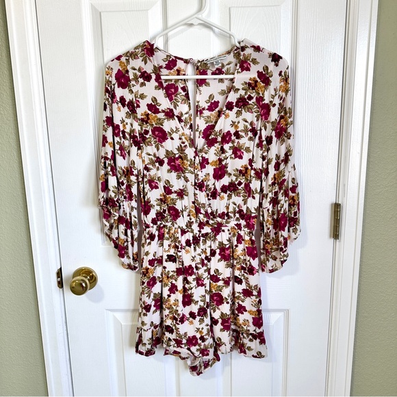 Long-Sleeved Flowered Romper - Picture 1 of 4